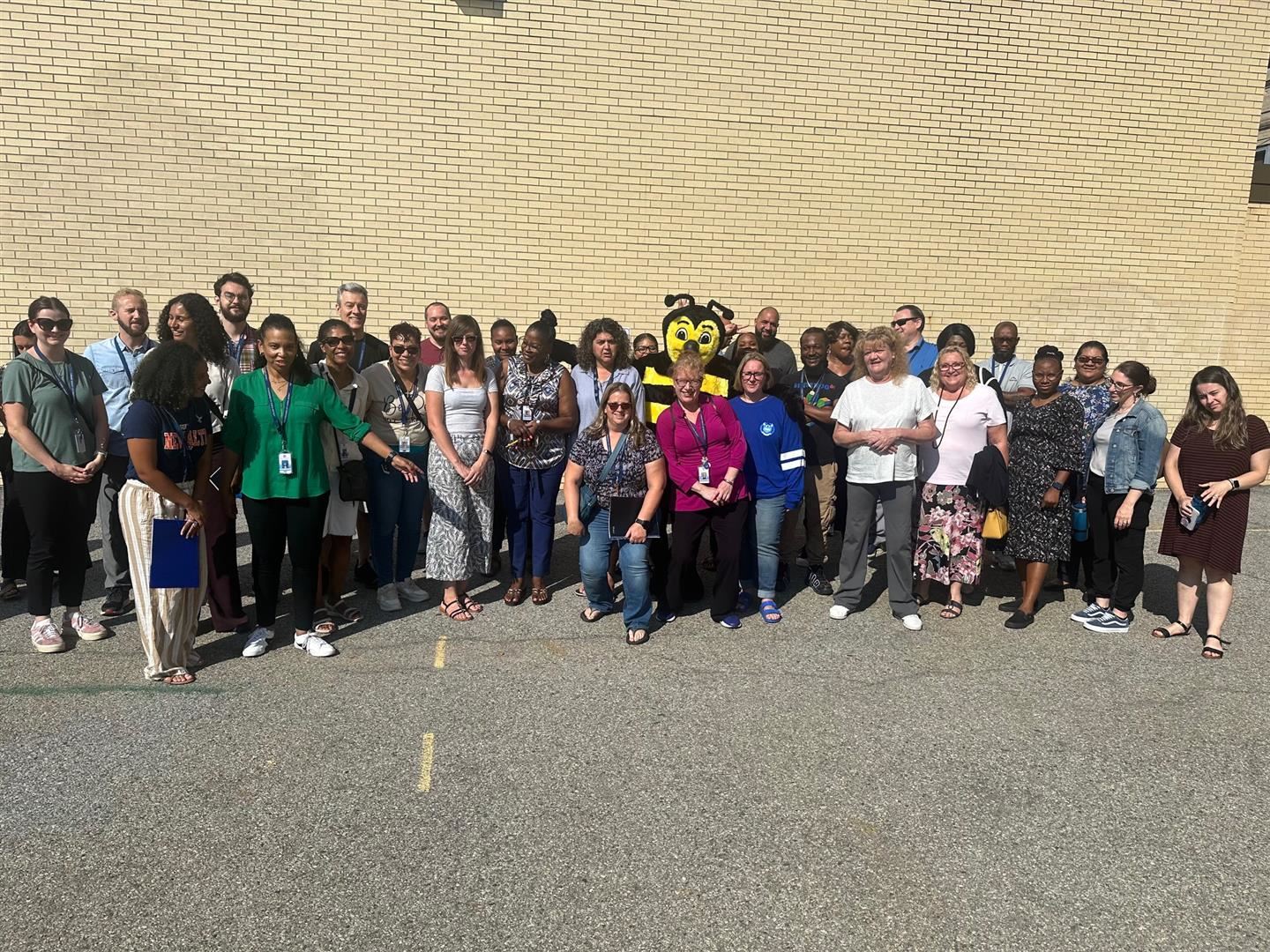  New employees and district leaders pose together at orientation